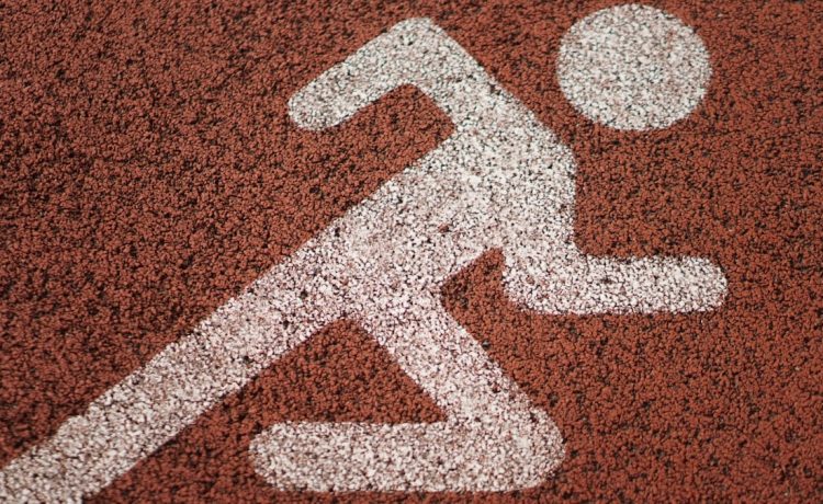 a handicap sign painted on a tennis court